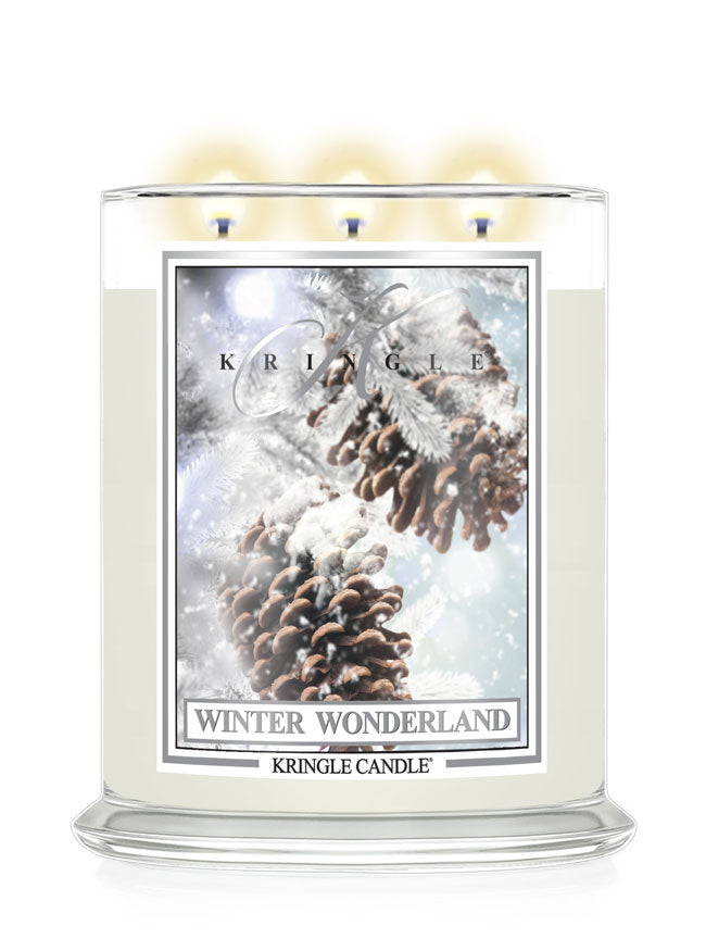 Kringle Candle Winter Wonderland candle with pine cone design on a white background